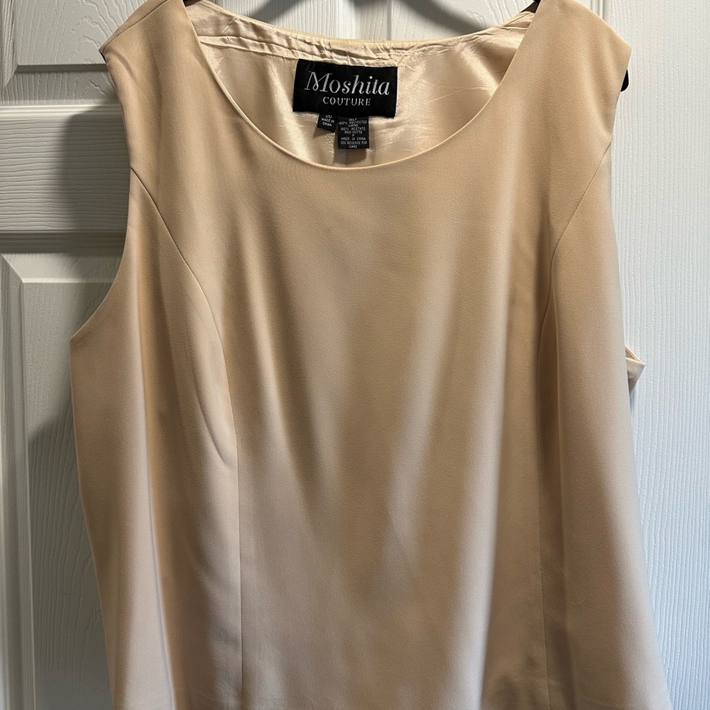 I am selling this three piece suit because I have lost weight.size 20.